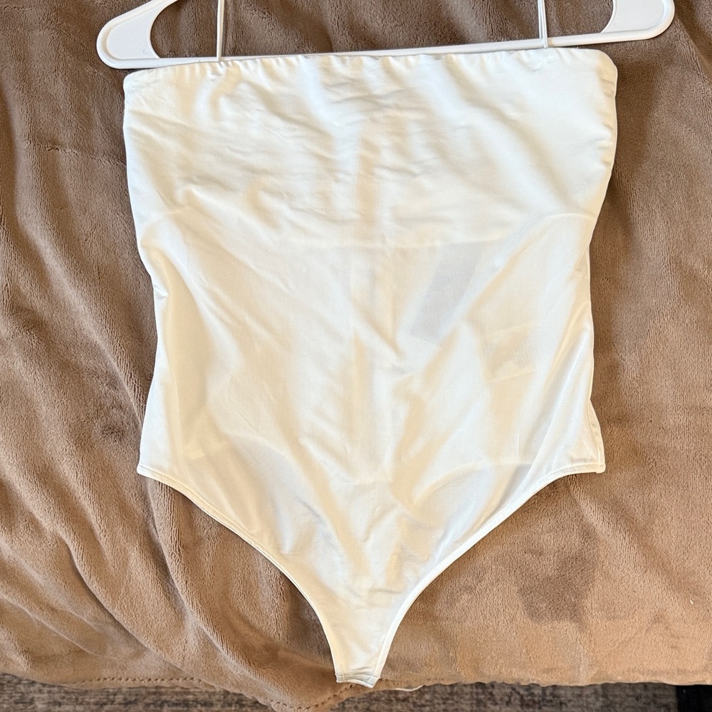 NEVER WORN NWT ALICE AND OLIVIA BODYSUIT